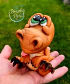 Dinosaurus-braon-figura-od-fondana